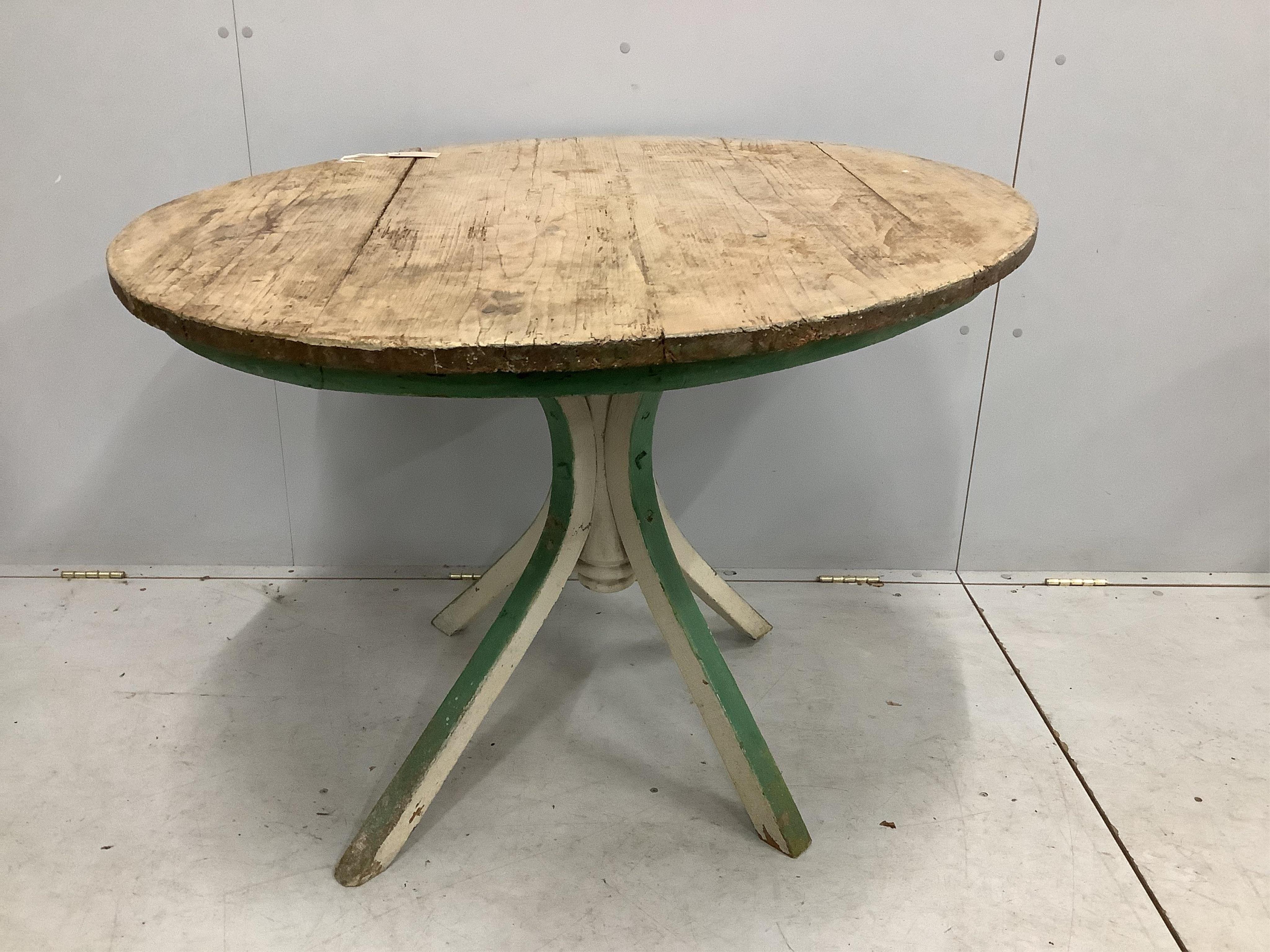 A 19th century circular pine breakfast table, diameter 101cm, height 78cm. Condition - poor to fair